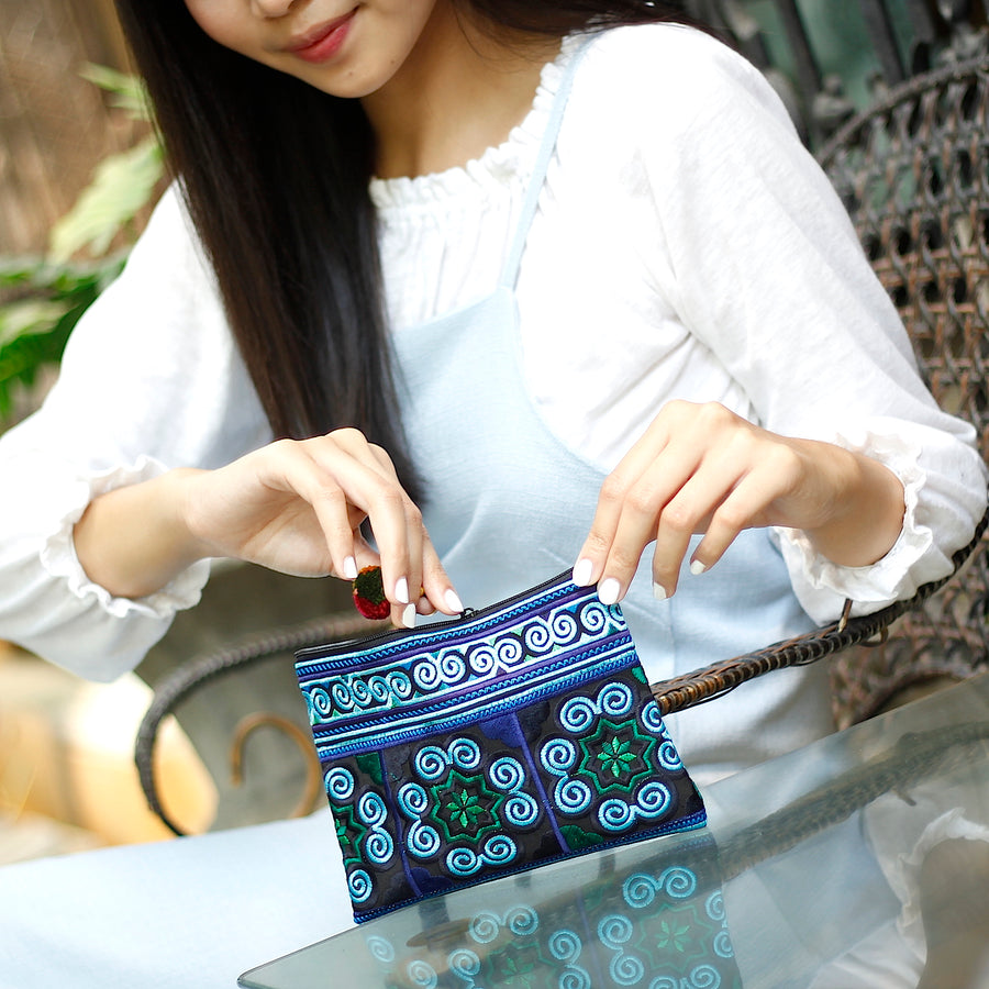 Sabai Jai Blue Cosmetic Pouch with woman
