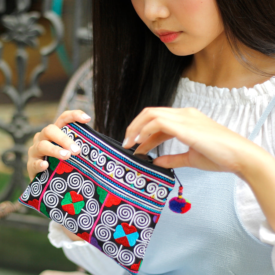 Sabai Jai Multicolor Cosmetic Pouch with woman