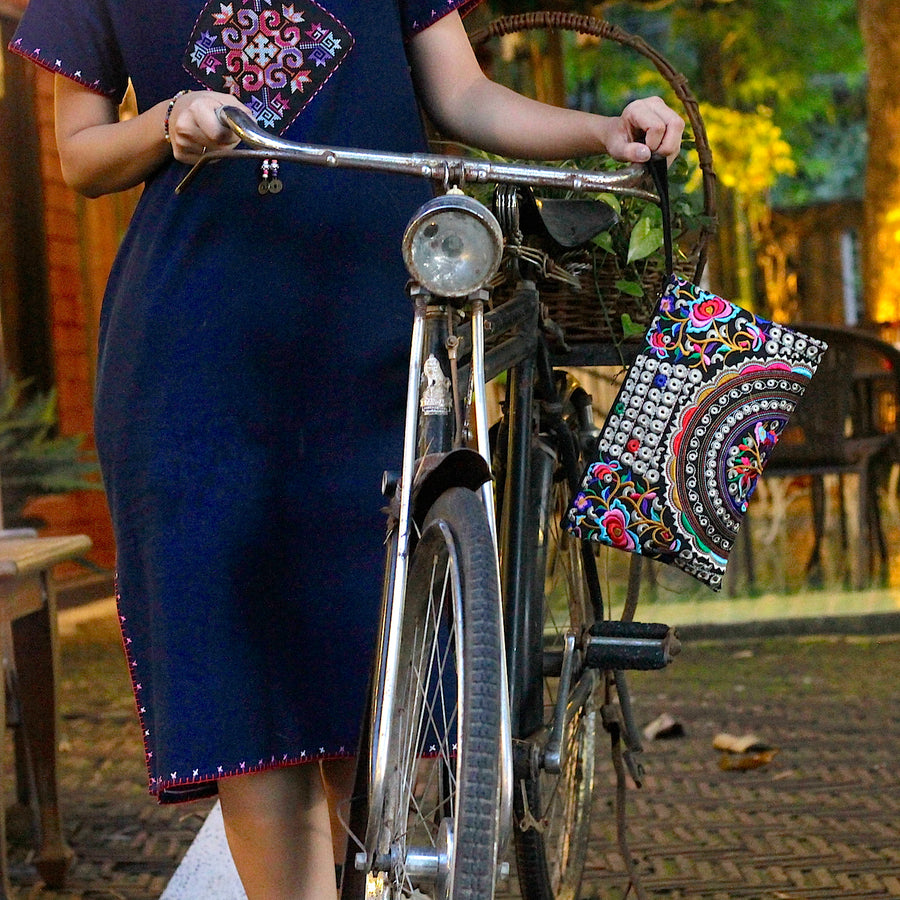 Sabai Jai Silver & Multicolor Rose Clutch on bike