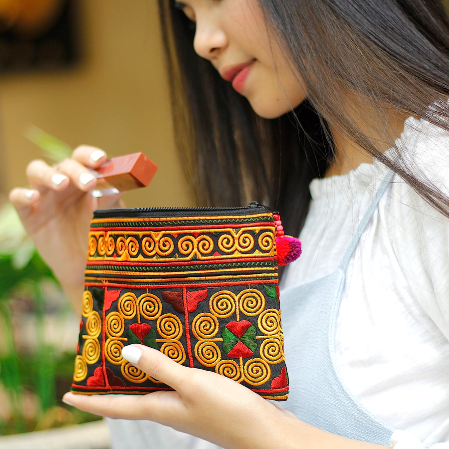 Sabai Jai Red Cosmetic Pouch on hand